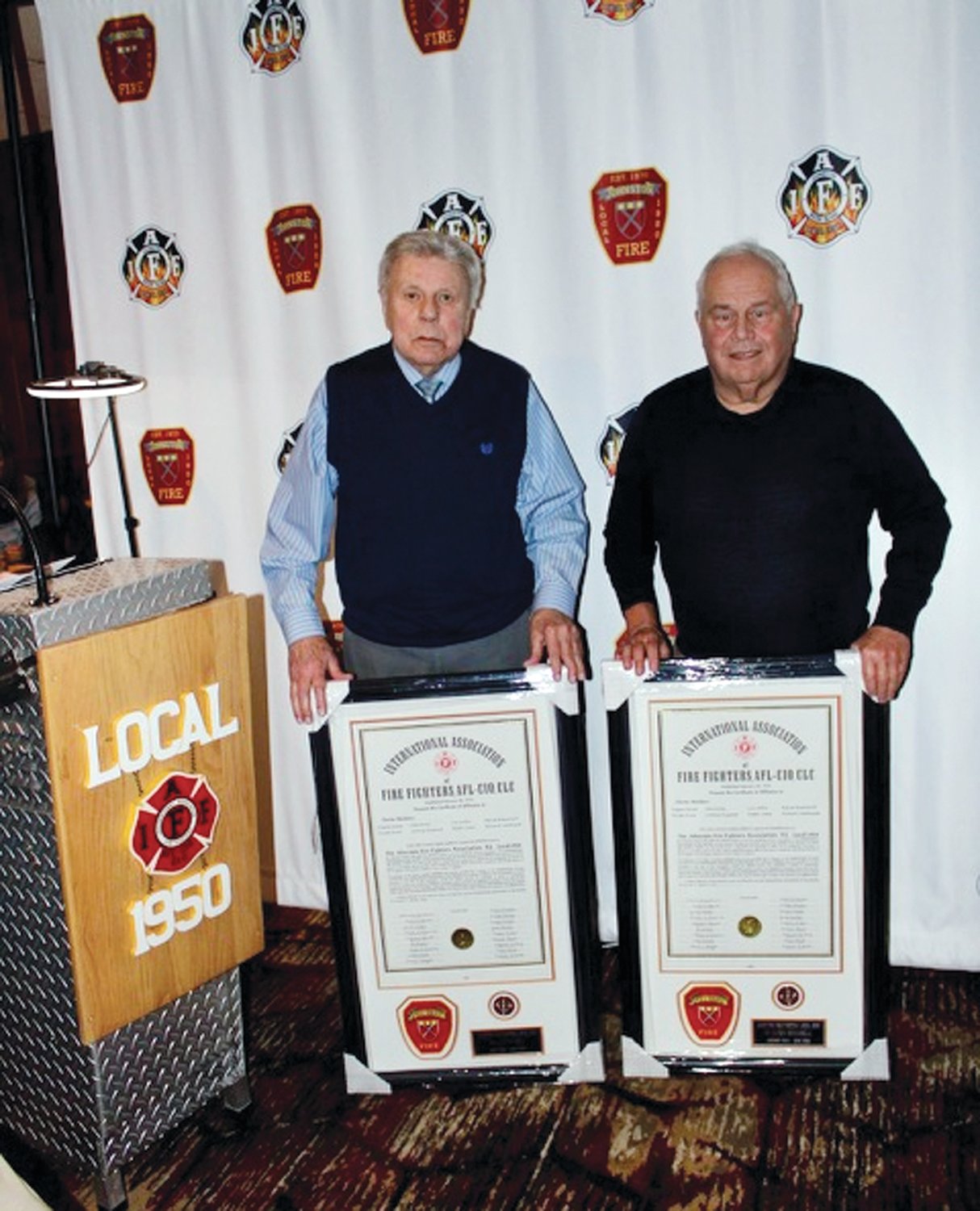 GRAND GIFTS: Local 1950 presented frame copies of the original IAFF Charter to first-ever President Clayton Quick and Al Masciarelli during the recent 50th-anniversary celebration.